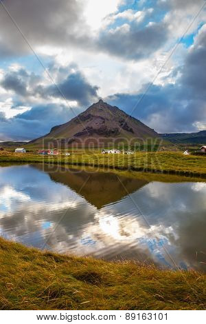 Quiet summer evening on Iceland. Sunset in the fishing village of Arnastapi