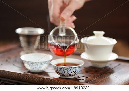 China Tea Ceremony With Puerh Tea Brewing In Haiwan