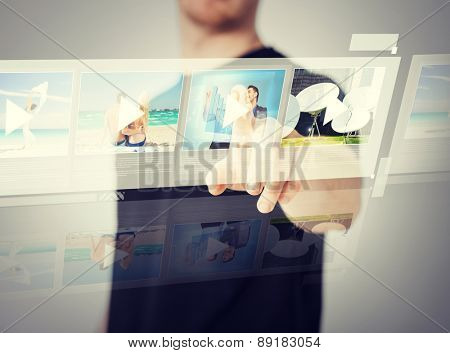 technology, internet and networking concept - man pressing button on virtual screen