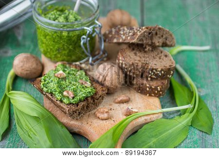 Ramson, Wild Garlic And Sauce Pesto On A Wooden Table