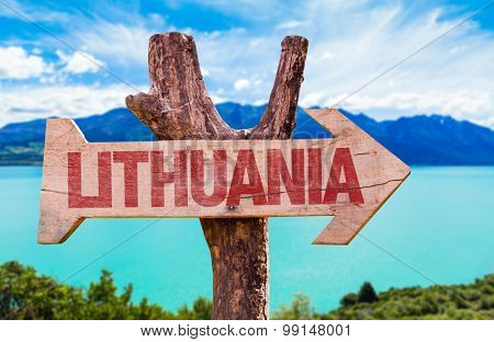 Lithuania wooden sign with lake background