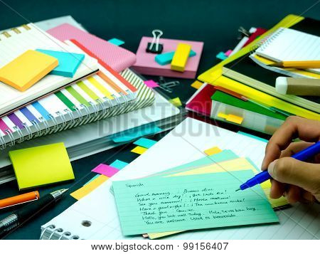 Learning New Language Writing Words Many Times On The Notebook; Spanish