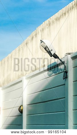 Street Wall Lamp At Cement Fence