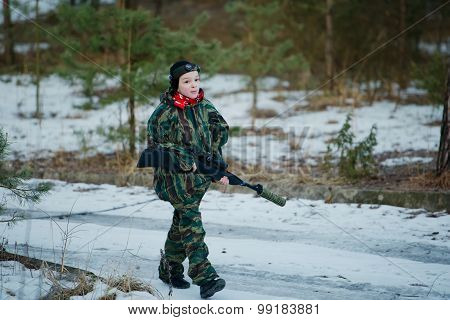 boys playing with gun during laser tag