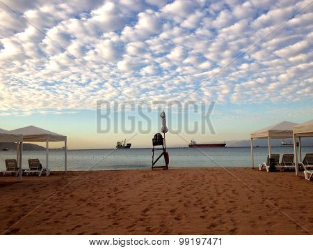 Beach view on the ships in the Sea port