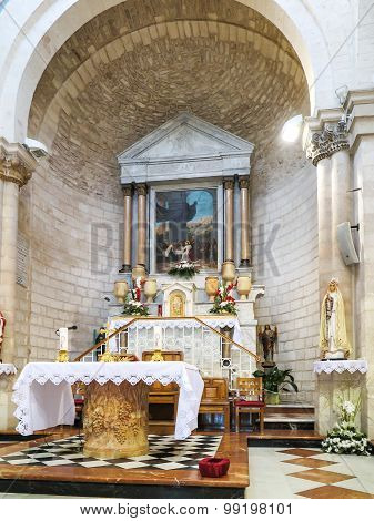 CANA, ISRAEL  July 8, 2015: The altar in the church of the first miracle, changing water into wine