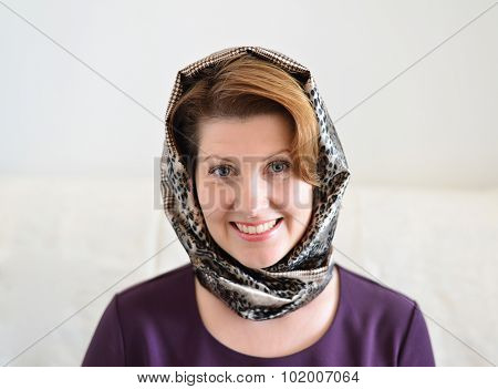 Portrait Of A Woman In  Headscarf. Russian Style.