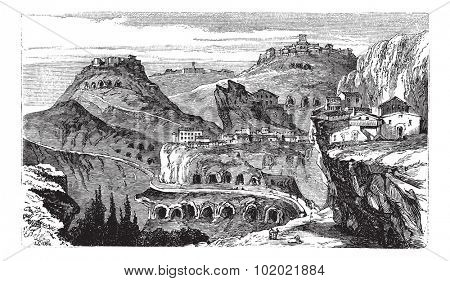 Countryside view of Castrogiovanni vintage engraving. Old engraved illustration of roofed residential structures on mountain. Trousset encyclopedia (1886 - 1891).