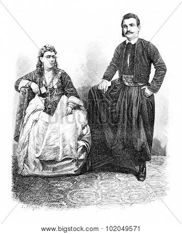 Muslim Man and Woman in Acre, Israel, vintage engraved illustration. Le Tour du Monde, Travel Journal, 1881