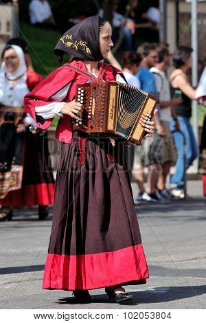 Musicians With The Traditional Costume Of Sardinia.