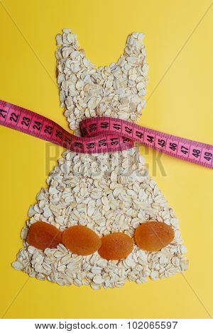 Dress Shape Made From Oatmeal With Measuring Tape