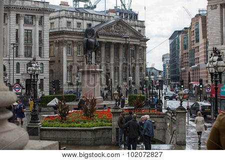 LONDON, UK - SEPTEMBER 17, 2015: City of London. Bank of England square view after the rain with lot