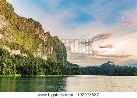 Lake And Cliff And Morning Sky