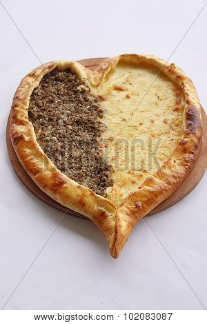 Turkish meat and cheese pizza