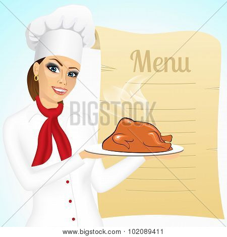 smiling female chef with christmas roasted turkey