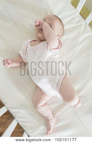 Baby In A Baby Bed