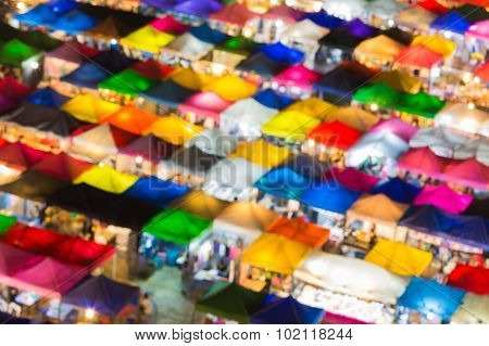 Close up multiple colours umbrella of weekend market, Blurred bokeh background