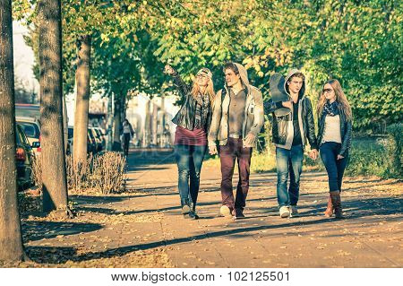 Group Of Happy Best Friends With Alternative Fashion Look Walking At The Park - Hipster Tourists