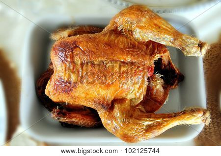 Flat lay photo of a Cooked chicken.