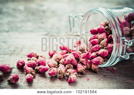 Rose Buds In Glass Jar. Selective Focus.