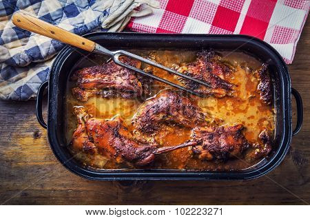 Roast-confit rabbit in wine-mustard sauce and cumin.