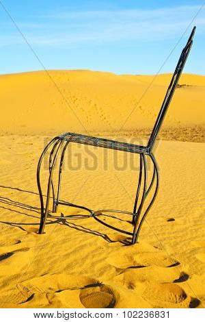 Table And Seat In Desert    Yellow Sand