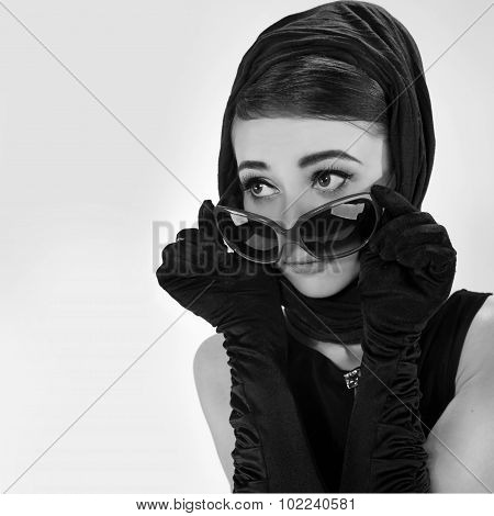 portrait of beautiful young woman in retro style . copy space.