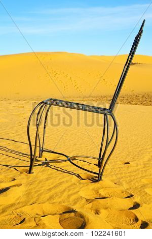 Table And Seat In Desert    Yellow Sand