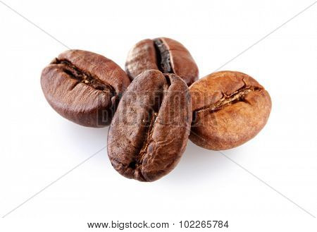 Brown coffee beans isolated on white