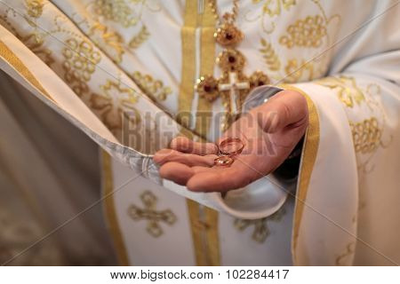 Priest With Rings