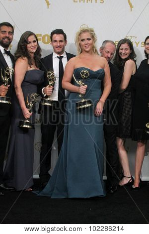 LOS ANGELES - SEP 20:  Amy Schumer at the Primetime Emmy Awards Press Room at the Microsoft Theater on September 20, 2015 in Los Angeles, CA