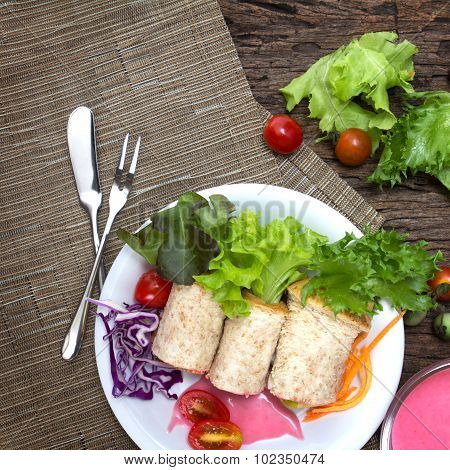 Fresh Whole Wheat Bread Wraps With Vegetables And Fruit On The Plate , Healthy And Clean Food Concep