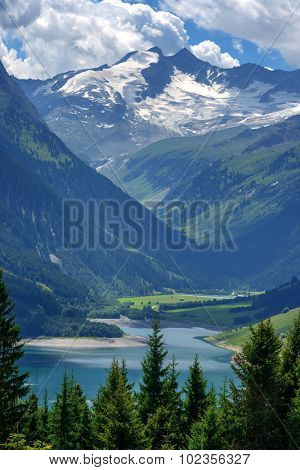 Amazing summer morning on the fantastic Speicher Durlassboden lake. Alps, Austria, Europe.