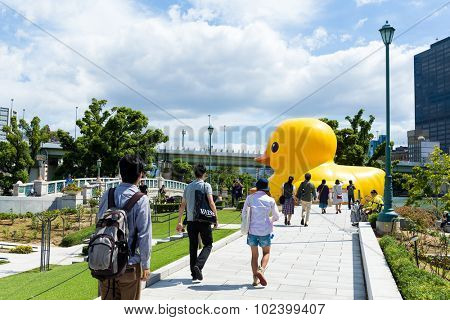 Japan Osaka - September 19: The giant duck in osaka on September 19 2015. :Yellow Duck Sculpture By Florentijn Hofman outside Nakanoshima park