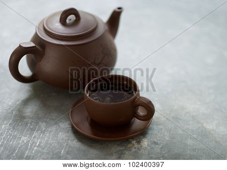 Teapot and cup of tea