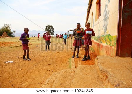 Malealea, Lesotho - August, 27th, 2015: local school; students during a break.