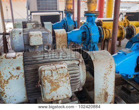 Old Electric Water Pumps, Full Of Rust.