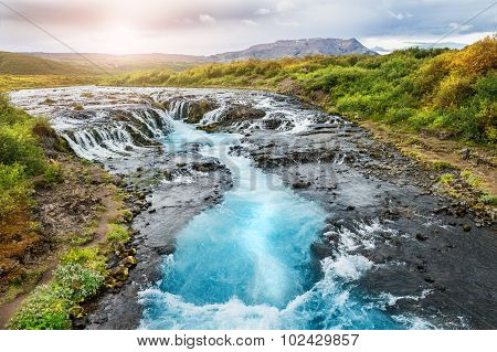 Beautiful Bruarfoss Waterfall With Turquoise Water In Iceland