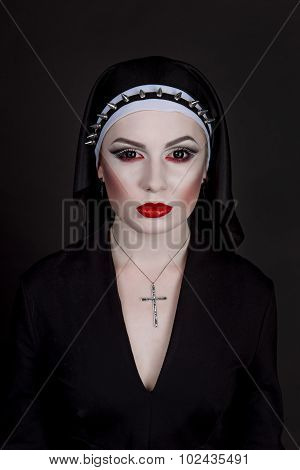 Halloween. Girl Dressed In Evil Sexy Nun