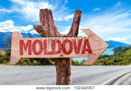 Moldova wooden sign with road background