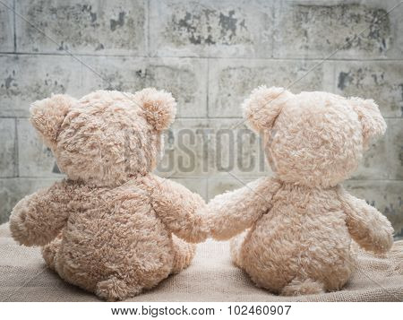 Teddybears holding hands