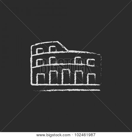 Coliseum hand drawn in chalk on a blackboard vector white icon isolated on a black background.