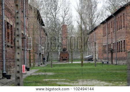 OSWIECIM, POLAND - APRIL 16 2015: Buildings in the former German concentration camp in Oswiecim Poland Oswiecim was the largest German concentration camp in Poland during World War II.