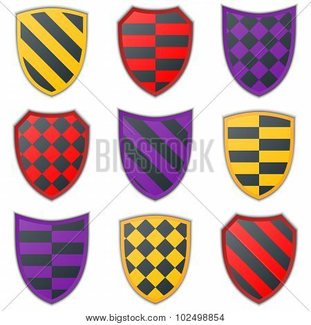 Set Of Colorful Shield Icons On A White Background.