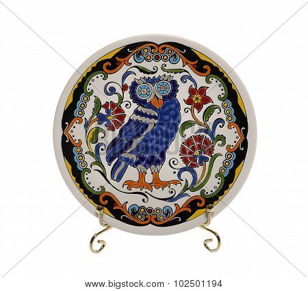 Decorative ceramic saucer with owl and ornament