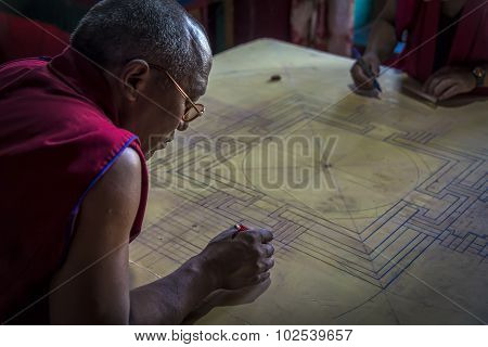 Monk Working On Mandala In Diskit Gompa, Ladakh