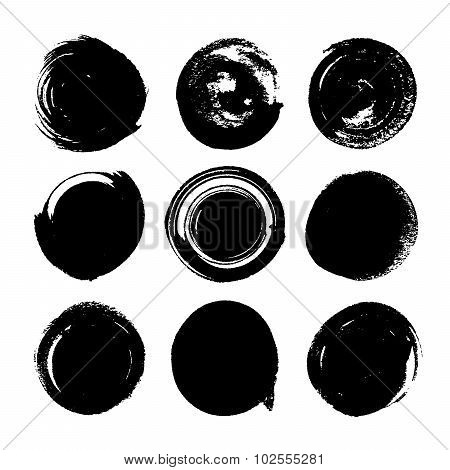 silhouette ink spots on a white background