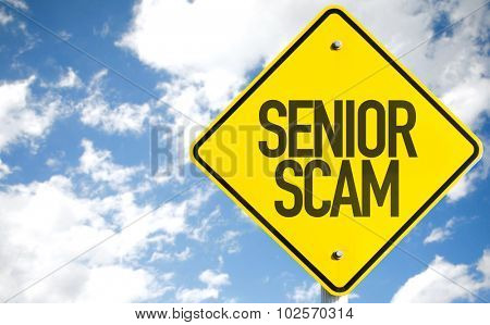 Senior Scam sign with sky background