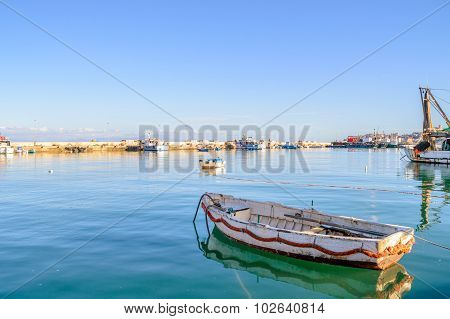 Rusty Old Boat Lonely In A Harbor