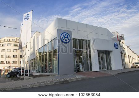 Volkswagen car maker logo on a building of czech dealership